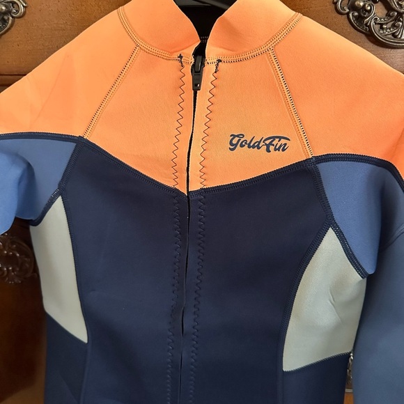 Gold Fin Other - Women’s Goldfin wet suit top. Multicolored. New without tags. Size Small